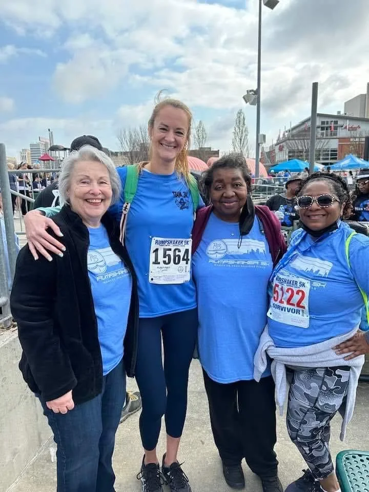 Four Rumpshaker participants smiling together at Regions Field.