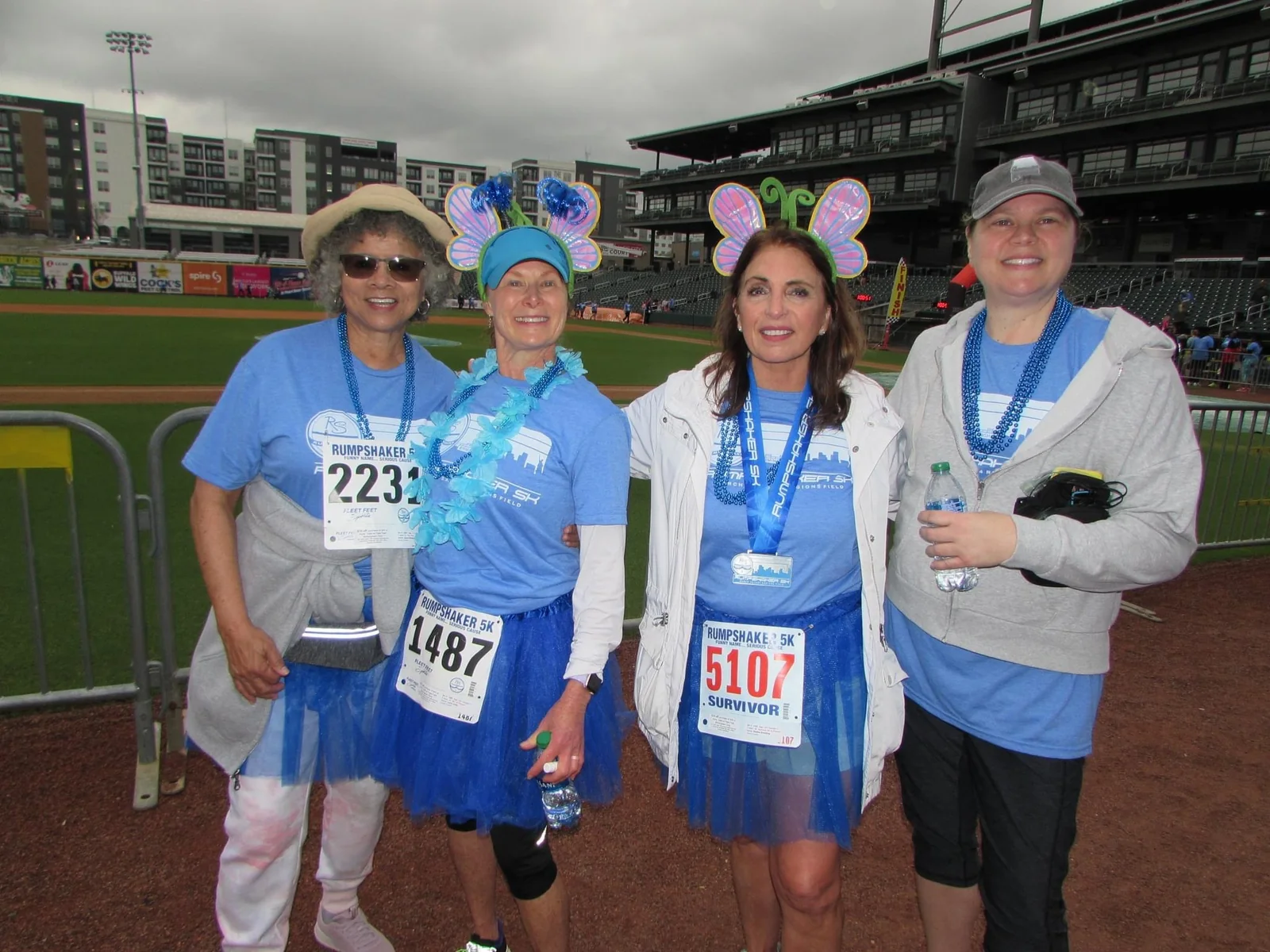 Four Rumpshaker participants standing together near the finish area.