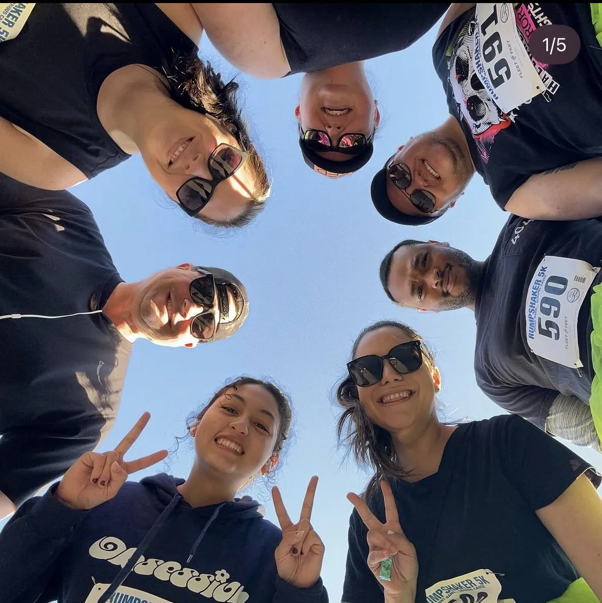 Rumpshaker participants smiling in a circle before or after the event.